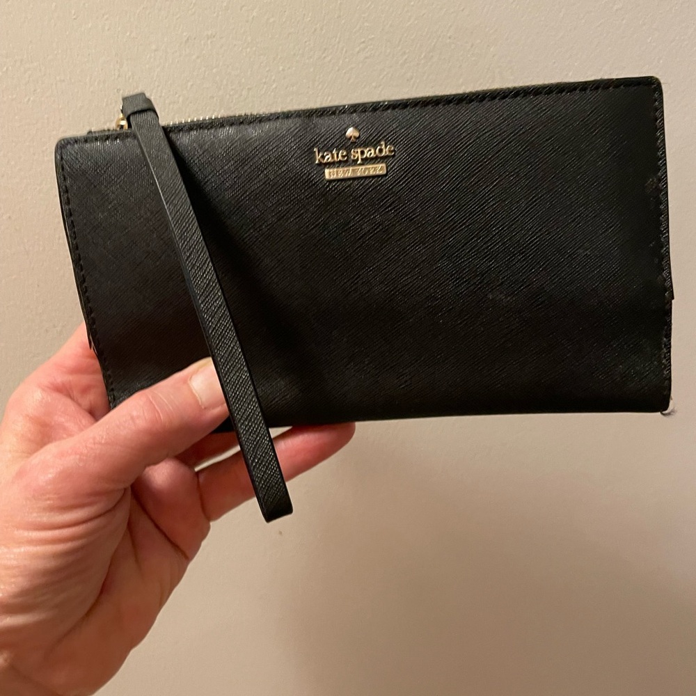 kate spade black leather wristlet with striped lining